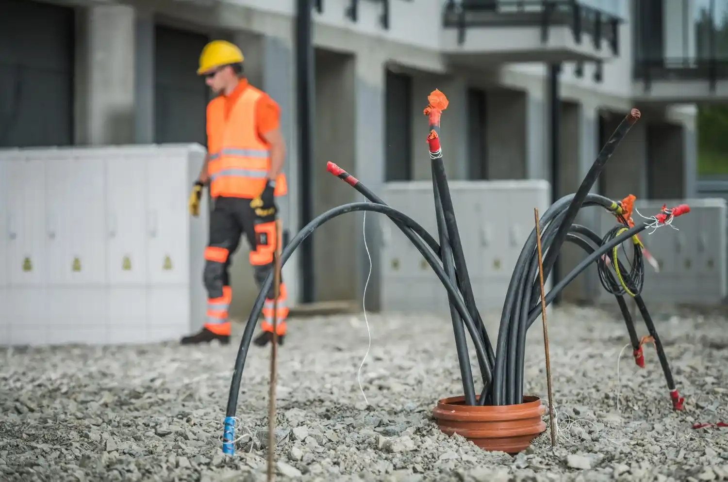 Utility worker using lineman tools during high voltage cable installation