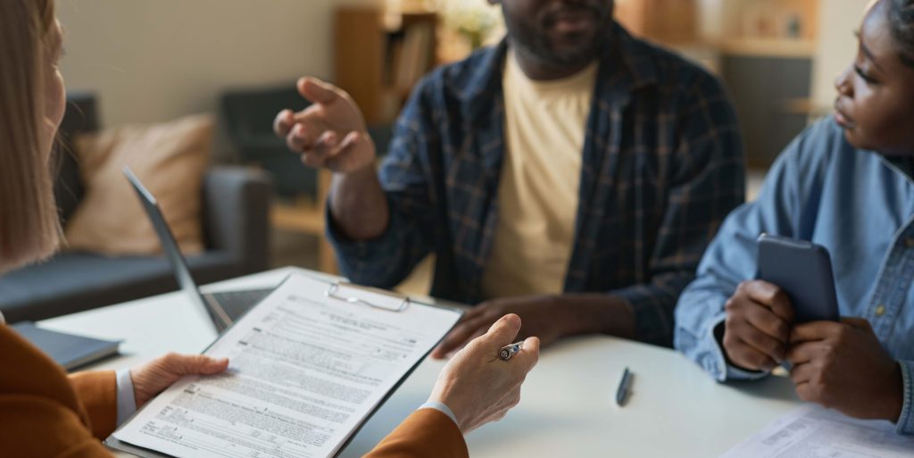 Closeup of Woman Holding Clipboard Consulting Family