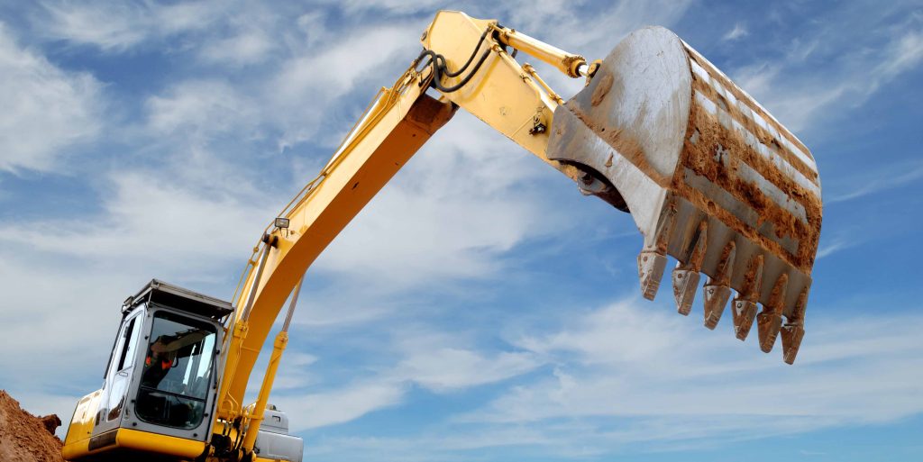Excavator loader in sandpit