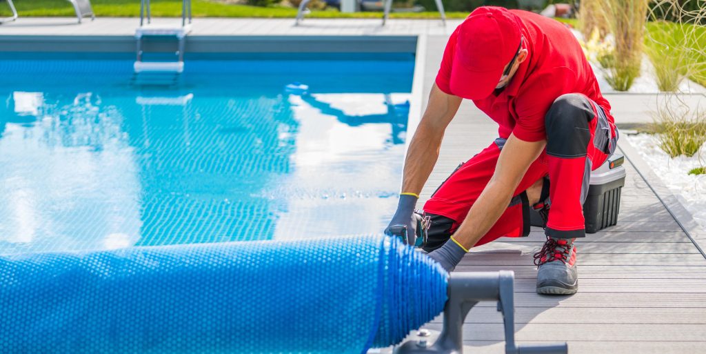 Technician Finishing Pool Deck Installation
