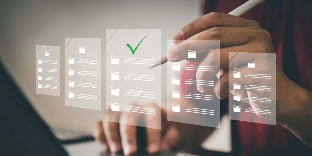 One person is using a computer. Digital document management conc