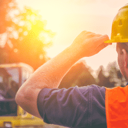 Construction contractor wearing a hard hat