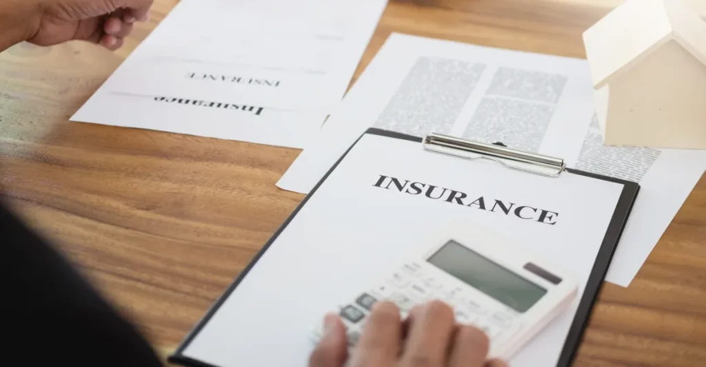 A client reviewing an insurance policy on a clipboard