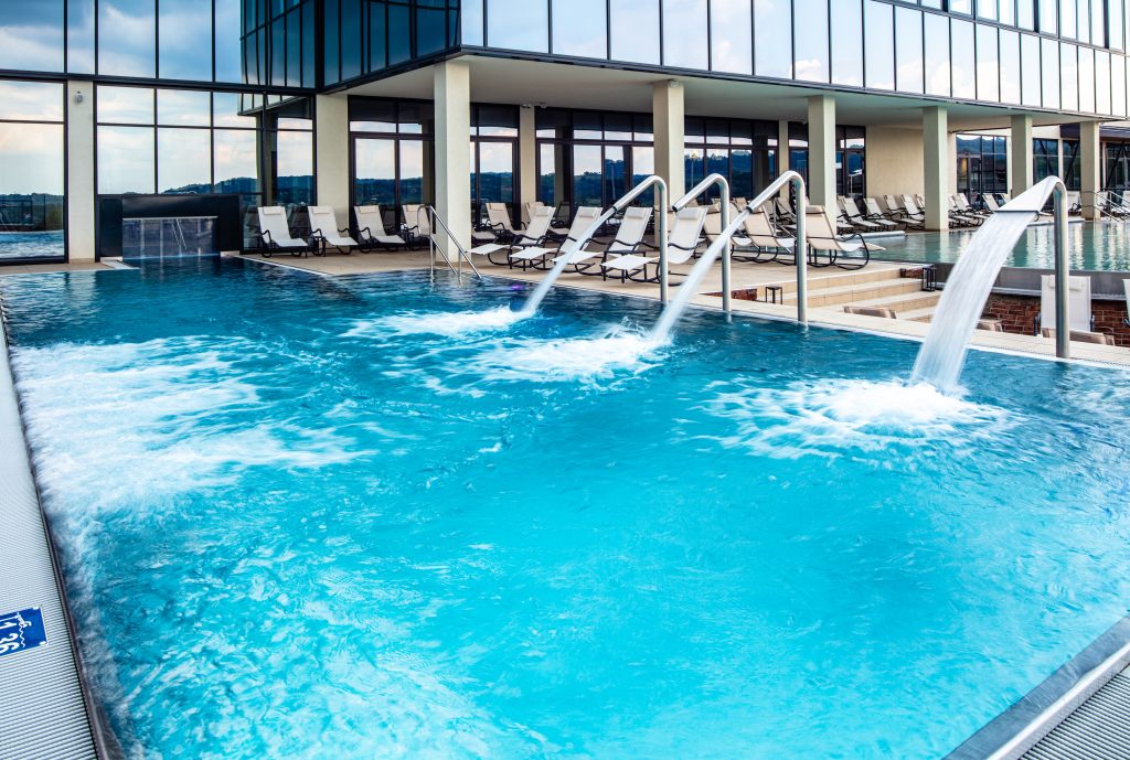 Outdoor swimming pool at luxury hotel.