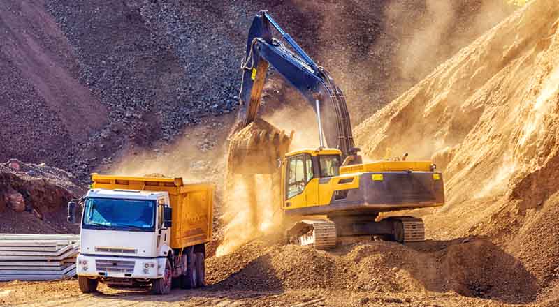 excavator-dump-truck-800x440 Excavator dumping earth into dump truck