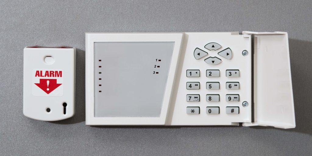 Panel security system on a gray background. Close-up.