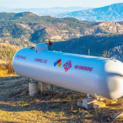Propane tank on top of a mountain vista