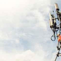 Trade contractor repairing communications tower