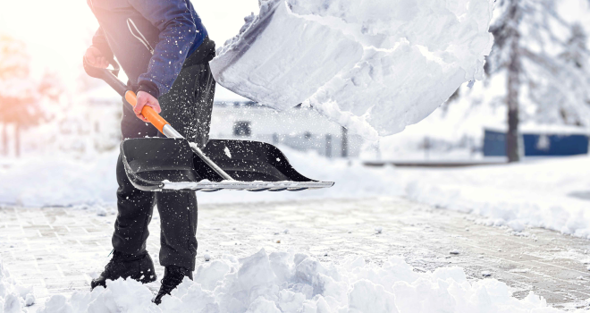 snow-shoveling Shoveling snow from sidewalk